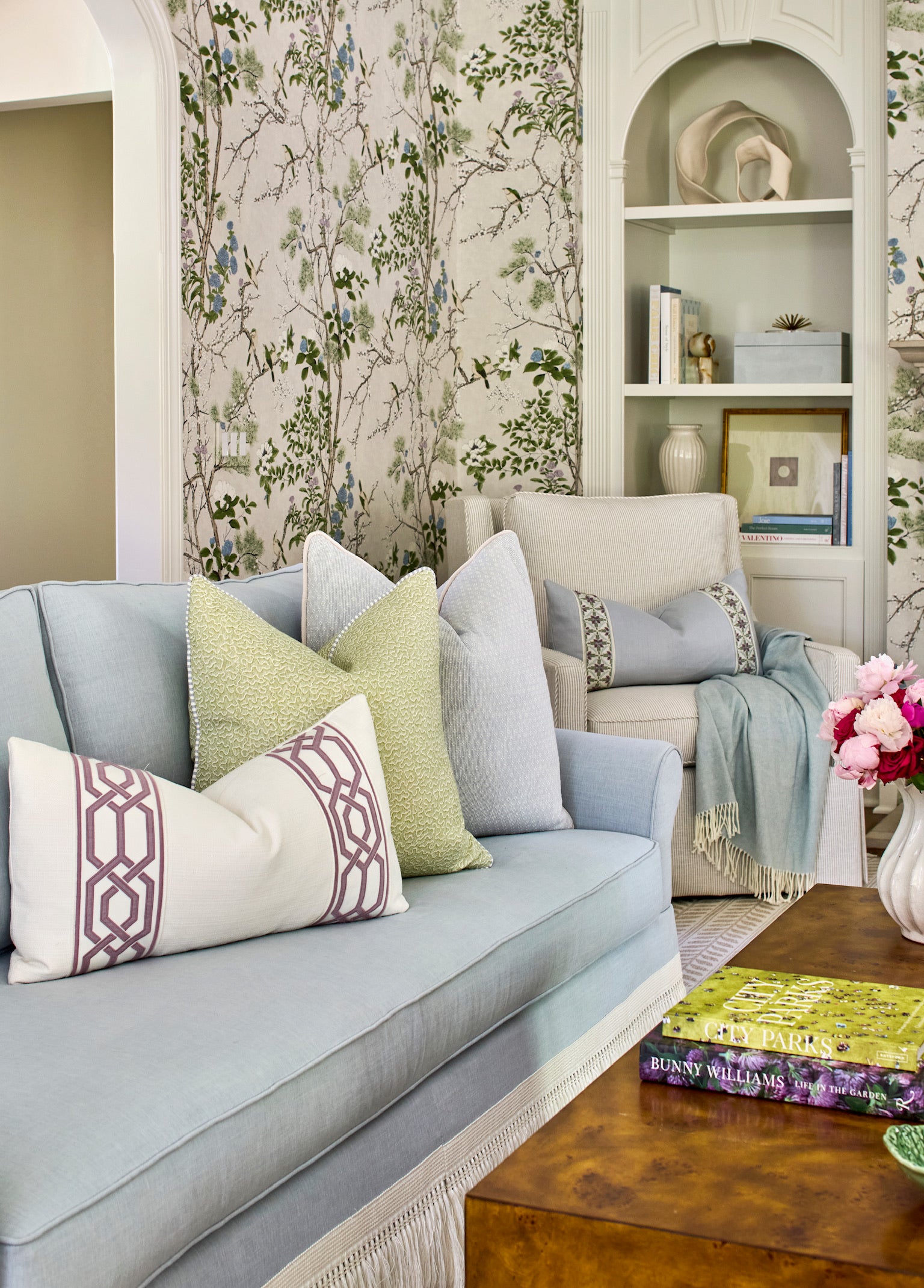Wesley Sofa featuring clean lines, a structured back, and traditional rolled arms, upholstered in Misty Sky blue fabric with a tailored fringe skirt for a polished and timeless living room silhouette.